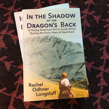 five copies of paperback book